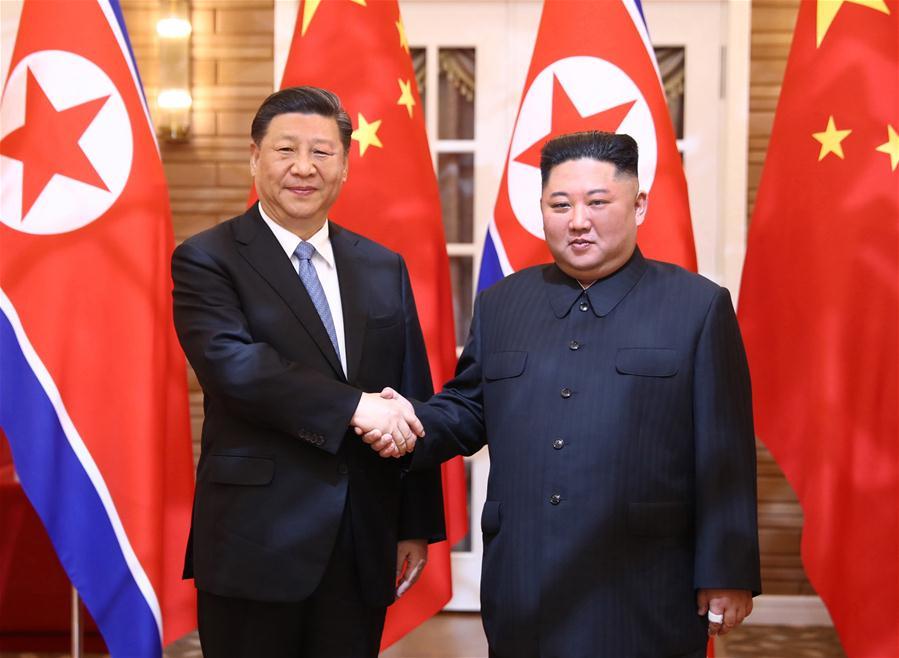 Hai ông Tập-Kim bắt tay đối mặt ‘những thay đổi quốc tế nghiêm trọng’