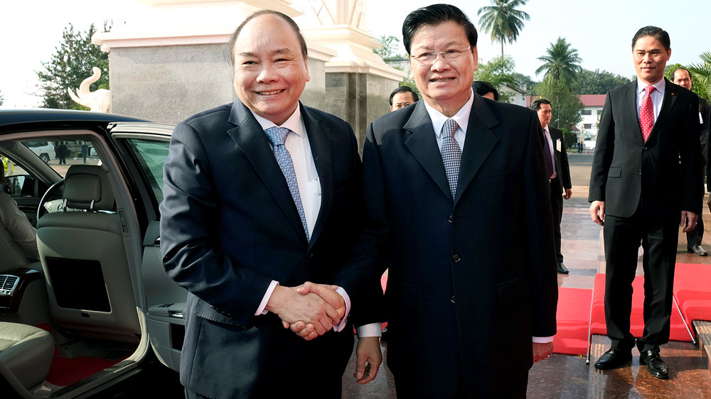 12 văn kiện hợp tác đưa quan hệ Việt-Lào lên tầm cao mới