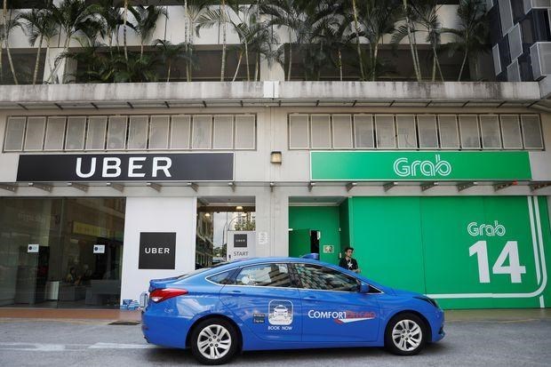 Singapore sẽ điều tra thỏa thuận chuyển nhượng giữa Uber và Grab