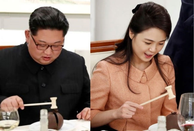 Vợ chồng Kim Jong Un thích thú dùng búa ăn món tráng miệng