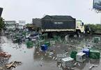 Container tông xe tải xoay ngang, vỏ bia đổ nát ngập quốc lộ 5