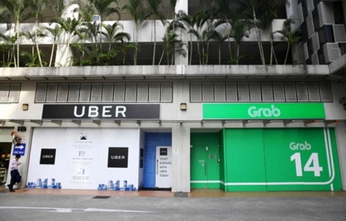 Singapore dọa hủy bỏ thương vụ Grab mua lại Uber