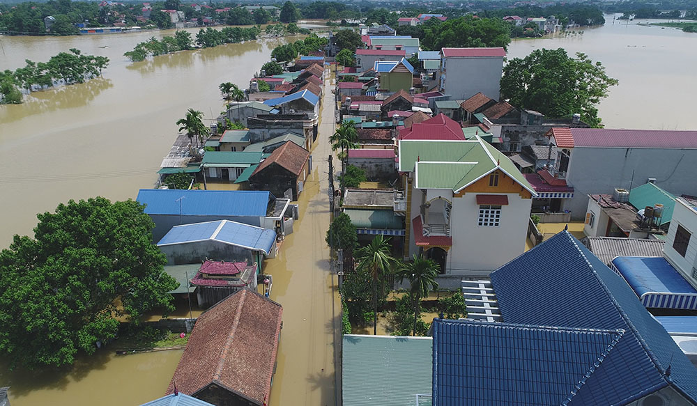 ngập lụt, dân chèo thuyền Hà Nội