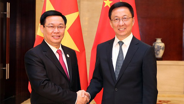 Phó Thủ tướng Vương Đình Huệ hội đàm với Phó Thủ tướng Trung Quốc