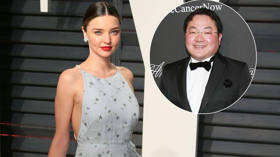 Cuộc tình bí mật ‘đẫm’ vật chất của siêu mẫu Miranda Kerr và tỷ phú bị truy nã