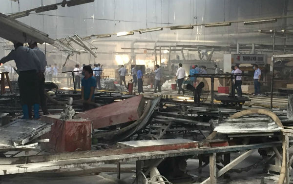 Cháy công ty gỗ Trung Quốc, hàng chục công nhân chạy thoát thân