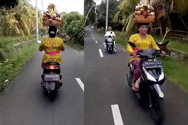 Độc lạ: Đội giỏ cây nặng trĩu, phóng xe máy vù vù