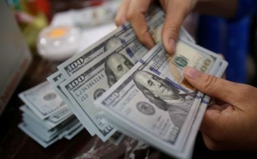 Vietnam central bank depreciates the greenback against the VND