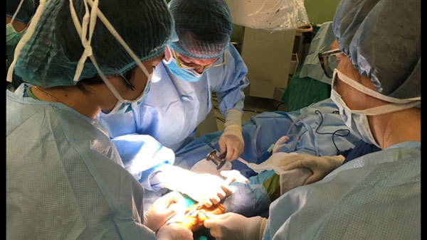 Healing hands from foreign surgeons help Vietnamese walk again