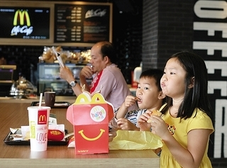 Fast food in fight to win over locals