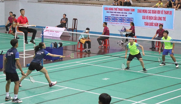 Young players compete at national badminton champs