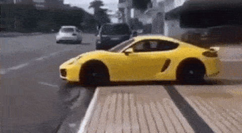 Phô diễn khả năng lái xe, Porsche Cayman cắm đầu vào biển hiệu