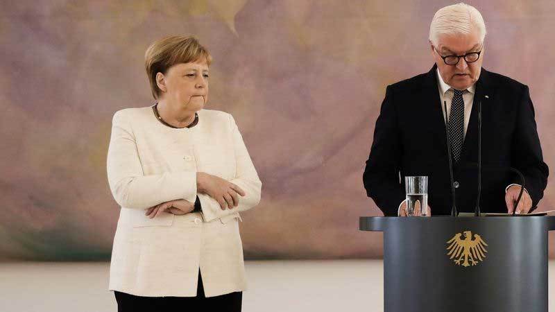 Tình báo các nước tìm lý do bà Merkel run rẩy khó hiểu