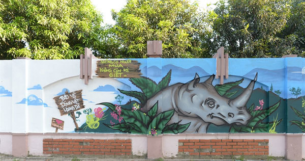 Artists paint murals to advocate for wildlife conservation