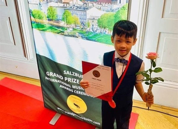 Little boy wins international music prizes
