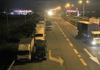 Long-haul truck drivers illegally park on highway to sleep