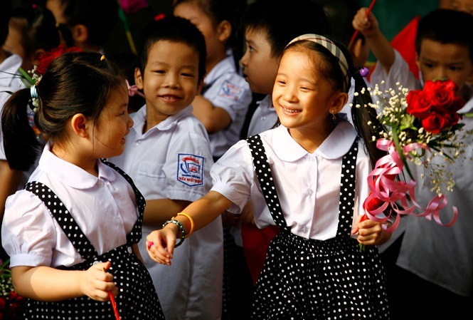 Despite ban, Vietnamese children are taught to read and write before going to school