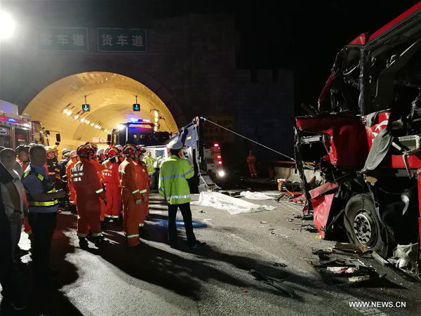 China road crash: at least 36 killed as coach hits truck