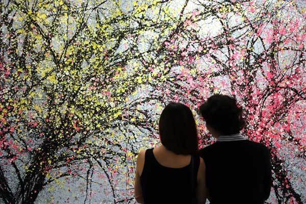 Peach blossoms the apple of this painter's eye