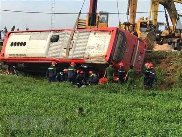 One dead and four injured after sleeper bus overturns