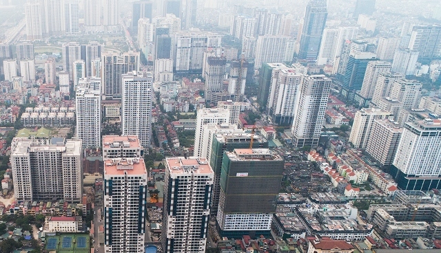 Factories leave, multi-story buildings arise in inner Hanoi