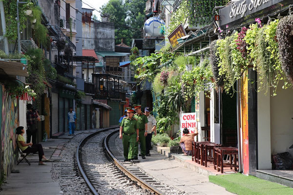 No hope for popular train street’s cafés to resume