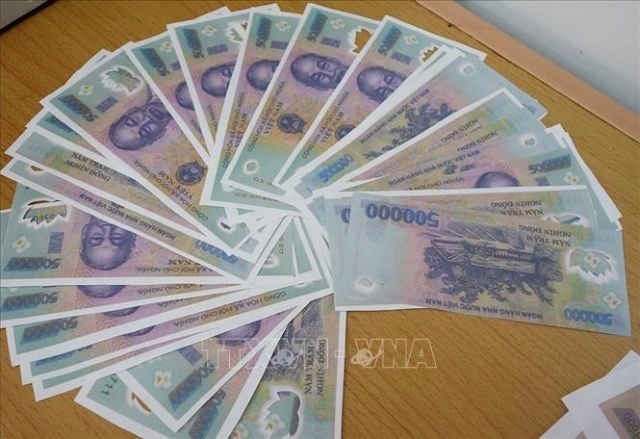 Vietnam Central Bank calls for counterfeit cash vigilance