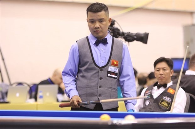 Vietnamese cueists win first match at three cushion billiard world event