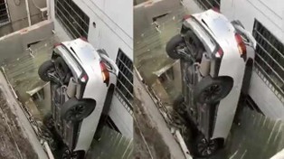 Đạp nhầm chân ga, tài xế lái xe SUV lộn ngược lên mái nhà người dân
