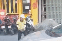 Nữ nhân viên taxi chặn đầu, dùng đá đập méo ô tô Grab ở Đà Nẵng