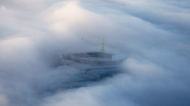 Mountain town in the fog