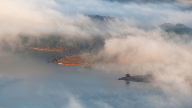 Mountain town in the fog