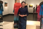 Painter creates unique harmony between Ao Dai and wood-carved paintings