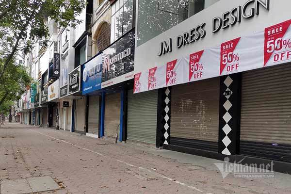 Phố lặng vắng, quán xá muôn nơi cửa đóng then cài chống 'giặc' Covid-19