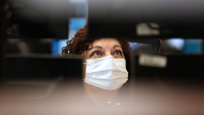 Coronavirus: The US clothing firms now making gowns and gloves
