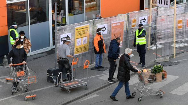 Coronavirus: Austria and Italy reopen some shops as lockdown eased