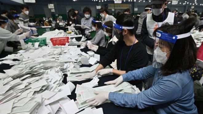 South Korea election: Ruling party wins amid coronavirus outbreak