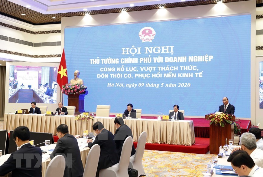PM Phuc tells Vietnam to restart the economy