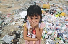 Young photographer tells touching stories about disadvantaged kids