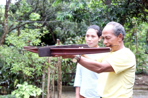 Elderly villager still a dab hand with the crossbow