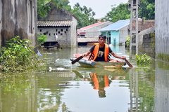 How can Hanoi prepare for heavy rains and floods?