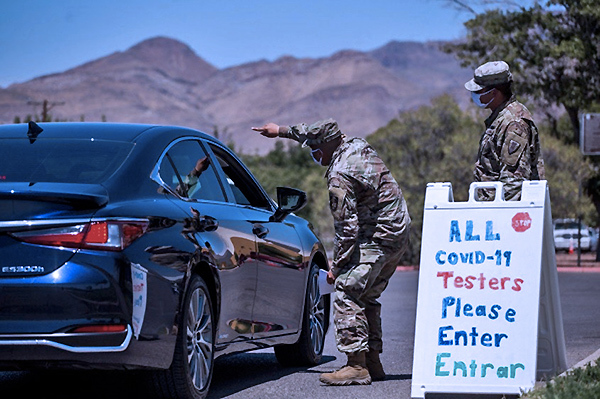 Ca nhiễm mới ở Mỹ tăng chóng mặt, Trung Quốc hạ mức cảnh báo Covid-19