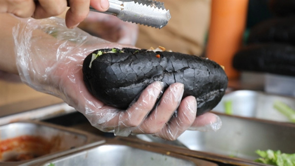 Enjoy the unique black banh mi of Quang Ninh