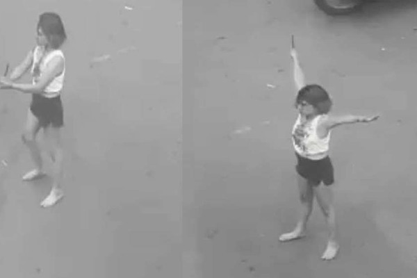 Kỳ lạ cô gái cầm dao ‘phân luồng’ giao thông ở trung tâm Sài Gòn