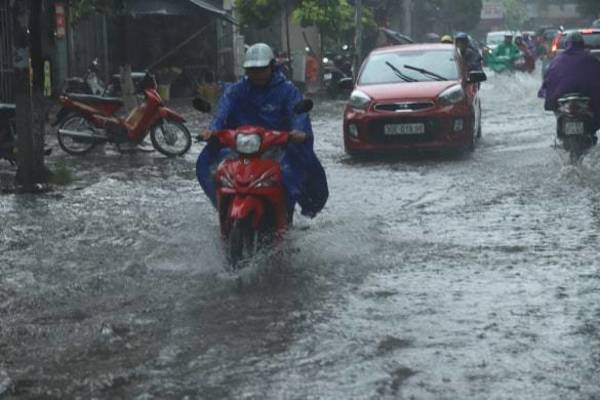 Không khí lạnh tràn về đêm nay, Hà Nội mưa to