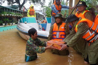 Heavy rain, floods wreak havoc in central provinces as new typhoon approaches