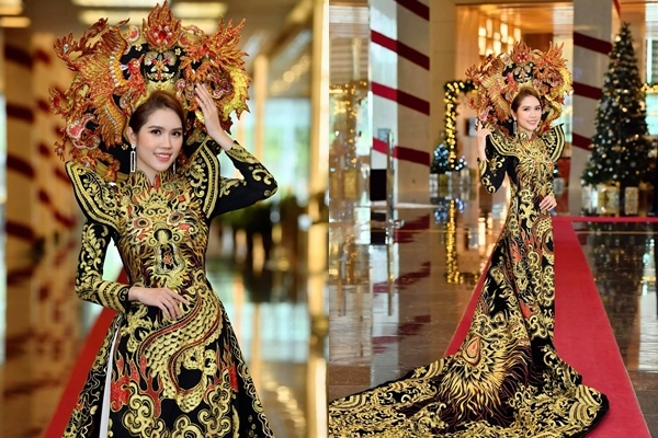 Vợ trẻ kém 13 tuổi của Minh Tiệp làm vedette trình diễn áo dài