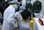 First persons receive injections of COVID-19 vaccine in Vietnam