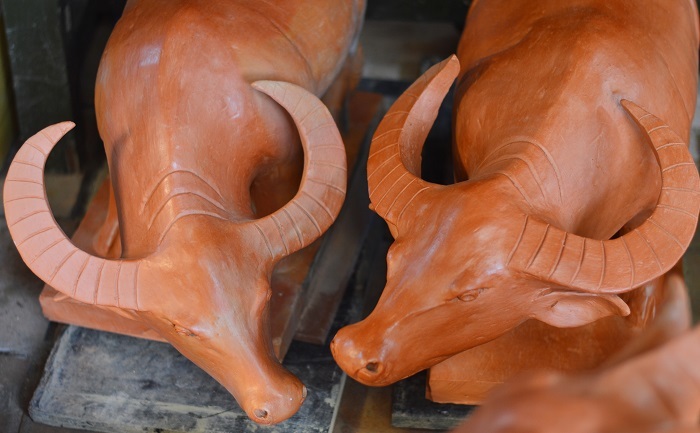 Making buffalo statues at 500-year-old pottery village in Hoi An