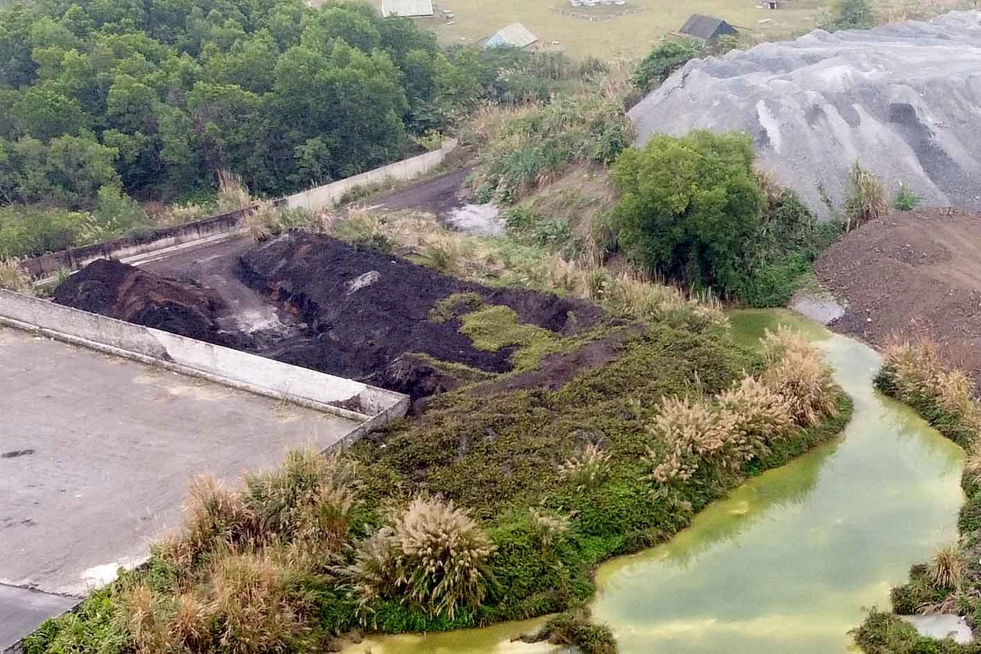 Mountains of hazardous waste covered by tarpaulin in Thai Nguyen city